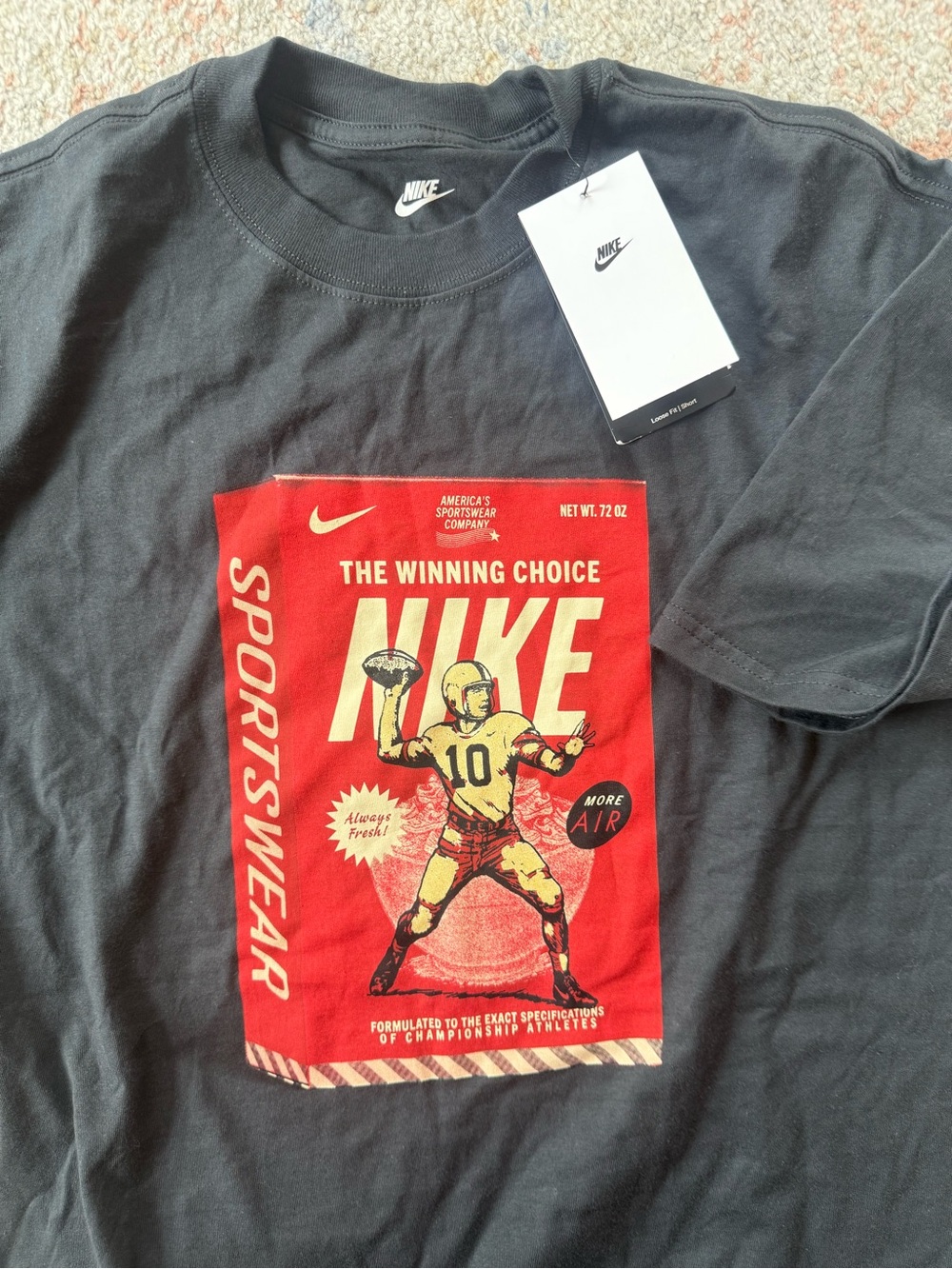Nike Men’s Black Short Sleeve Tee with Red & Cream Sportswear Graphic